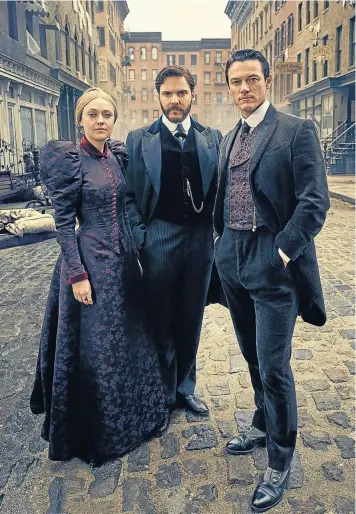  ??  ?? Sara Howard (Dakota Fanning), Dr Lazlo Kreizler (Daniel Brühl) and police secretary John Moore (Luke Evans) make up the crack Victorian-era team hunting a serial killer in ’The Alienist’.