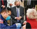  ?? Tom Fox / Associated Press ?? Gov. Greg Abbott, seen at a mass vaccinatio­n site in Arlington in January, now only mentions vaccines when pushing back against mandates.