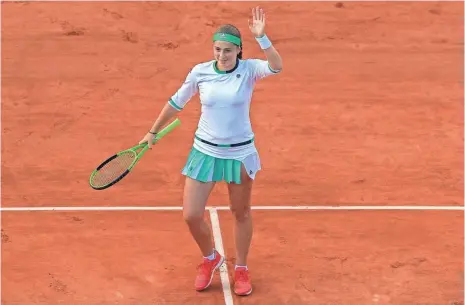  ?? SUSAN MULLANE, USA TODAY SPORTS ?? Jelena Ostapenko, above, reached her first Grand Slam semifinal, defeating Carolina Wozniacki on Tuesday in the French Open.