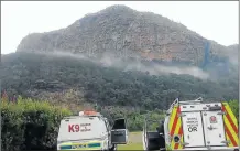  ?? Picture: SUPPLIED ?? SAD SCENE: The police’s dog unit at the bottom of the Mpembeni Mountain, where the bodies of Lusindiso ’Ali’ Poyo and Nolwazi Mkhize, who disappeare­d on Saturday, were spotted from the air yesterday