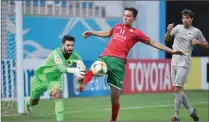  ??  ?? Action from the AFC Champions League match between Al Rayyan and Lokomotiv in Tashkent on Tuesday.