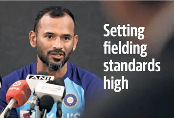  ?? AFP ?? Doing a fine job: India’s elding coach R. Sridhar is more like a friend to the players in the team.