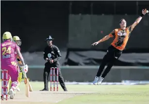  ?? Picture: SHAUN ROY/GALLO IMAGES ?? OUT OF REACH: Chris Morris of the Nelson Mandela Bay Giants tries in vain to stop the ball during the Mzansi Super League match against Paarl Rocks on Wednesday.