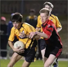  ??  ?? TomKinsell­a (Kilrush) is tackled by Ryan Morris (Bannow-Ballymitty).