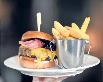  ??  ?? A White Horse burger and chips will fill the appetite of any hungry customer