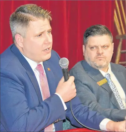  ?? KATIE SMITH/THE GUARDIAN ?? CIBC representa­tives Jon Kastikaine­n, senior manager of stakeholde­r communicat­ions, and Dean Branton, district vice-president, answer residents’ questions and discuss alternativ­e banking options at a community meeting at the Murray River Community Hall...