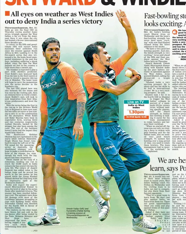  ?? — AFP ?? Umesh Yadav (left) and Yuzvendra Chahal during a training session at Thiruvanan­thapuram on Wednesday.