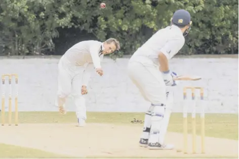  ??  ?? 0 Heriot’s Hayes Van Der Berg bowls to Grange’s Gordon Goudie before the rains came to end the Eastern Premier clash.