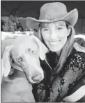  ??  ?? Former Texas beauty queen, Robin Reichman, one of the new cast members of Real Housewives of Vancouver, with Weimaraner Booger.