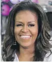  ??  ?? Michelle Obama says in her memoir she will never forgive U.S. President Donald Trump for putting her family at risk.