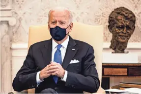  ?? SAMUEL CORUM/GETTY IMAGES ?? The expected passage of the $1.9 trillion COVID-19 relief package may give President Joe Biden momentum for his ambitious agenda, but his goal of bipartisan­ship has been elusive in the early going.