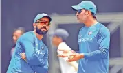  ??  ?? Virat Kohli and Mahendra Singh Dhoni.