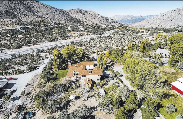  ?? Realty One Group ?? The property at 9590 Mule Deer Road is adjacent to Toiyabe National Forest.