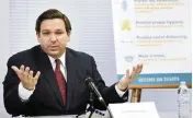  ?? BOB SELF Associated Press ?? Florida Gov. Ron DeSantis, at a roundtable discussion in Jacksonvil­le in August 2020, says YouTube and its parent company, Google, remove videos because they are ‘enforcers of a narrative.’
