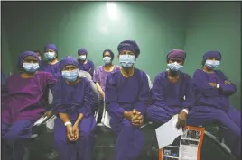  ?? (AP/Niranjan Shrestha) ?? Nepalese patients wait to receive anesthesia before eye surgery at the Tilganga Eye Center in Kathmandu, Nepal.