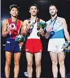  ??  ?? Artem Dolgopyat of Israel (left), Kenzo Shirai of Japan (centre) and Yul Moldauer of The United States of America (right), hold up their medals after taking top positions on the floor exercise during the individual apparatus finals of the Artistic...