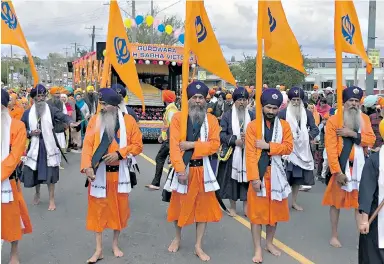  ??  ?? More than 1,000 people turned up Sunday for the Khalsa Day Parade for Vaisakhi.