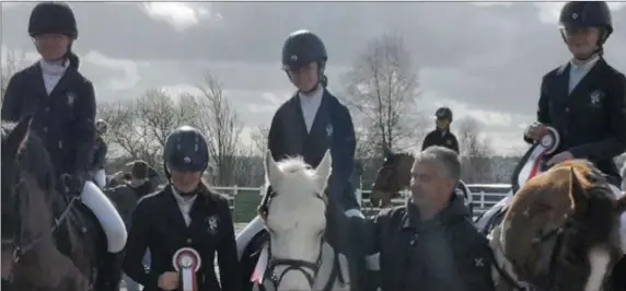  ??  ?? DCW Equestrian winners Sarah Ní Bhraonáin, Jessica Phelan, Naoise O’Neill and Ella Mulvey, with trainer John Mulvey.