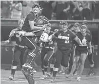  ?? PHOTOS BY CHERYL EVANS/THE REPUBLIC ?? Arizona State celebrates winning its super regional against South Carolina on Saturday at Farrington Stadium.