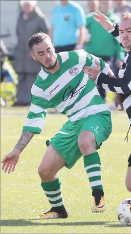  ??  ?? Newfoundwe­ll’s goalscorer Cormac Reid and Johnny Lynch (Quay Celtic) fight