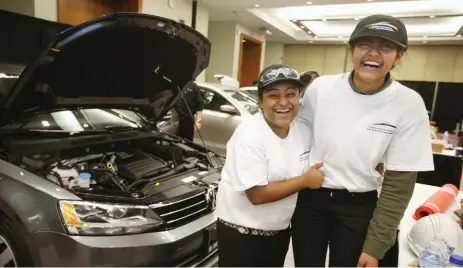  ?? VINCE TALOTTA/TORONTO STAR FILE PHOTO ?? Students Sajesha Manoharan and Nerissa D’souza were participan­ts in the Toronto Automotive Technology Competitio­n at the auto show last year.