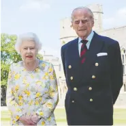  ?? STEVE PARSONS / PA WIRE / POOL VIA REUTERS FILES ?? When Prince Philip turns 100 on June 10, 2021, he'll get a congratula­tory telegram from Queen Elizabeth II just
like other British citizens hitting the milestone.