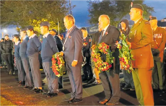 ?? Photo / Vicki Zieltjes ?? Wreaths were placed at the Cross of Sacrifice in Stratford during the Dawn Service.