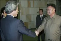  ?? Yomiuri Shimbun file photo ?? Prime Minister Junichiro Koizumi, left, shakes hands with North Korean leader Kim Jong Il before their talks in Pyongyang in September 2002.