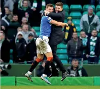  ?? Reuters ?? ECSTATIC: Steven Gerrard celebrates with Borna Barisic after Rangers beat Celtic. —