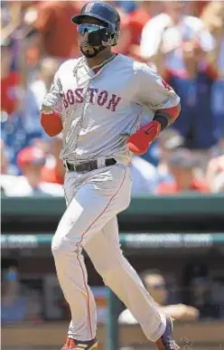  ?? AP ?? Eduardo Nunez scores on Jackie Bradley Jr. double as Sox top Nats.