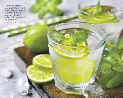  ?? GETTY IMAGES ?? A classic mojito is made with fresh mint, fresh lime, white rum and seltzer, but you can add all sorts of other fruit, from berries to pineapple.