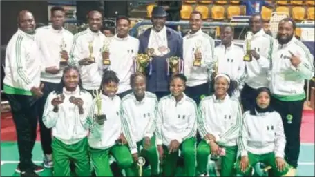  ?? ?? Nigeria’s contingent to the All Africa Senior Badminton Championsh­ip in a group photograph with President of the Badminton Federation of Nigeria, Francis Orbih Esq, ...at the weekend in Cairo, Egypt