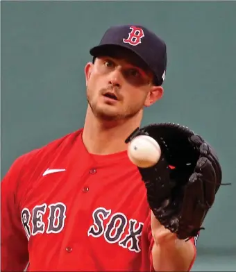  ?? STUART CAHILL — BOSTON HERALD ?? BOSTON, MA - June 1: Boston Red Sox relief pitcher Garrett Whitlock (72) catches the ball from the catcher in the first as the Red Sox take on the Reds in Inter-league play at Fenway Park on June 1, 2022 in , BOSTON, MA.