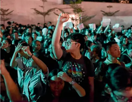  ?? PHOTO: GETTY IMAGES ?? Students and anti-Marcos activists take to the streets of Manila to protest the hero’s burial accorded to former Philippine dictator Ferdinand Marcos on November 18.