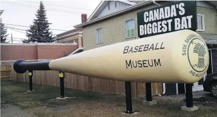  ?? — SASKATCHEW­AN BASEBALL HALL OF FAME AND MUSEUM ?? Canada’s biggest bat can be seen at the Saskatchew­an Baseball Hall of Fame and Museum in Battleford. The fibreglass bat is 15.2 metres long.