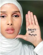  ??  ?? Somali-born model Rawdah Mohamed protesting over the proposed Hijab ban