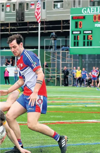  ??  ?? Stateside: New York’s Jamie Clarke with Paddy Maguire of Leitrim playing at Gaelic Park in the Bronx, and (below) journalist and former New York PRO John Riordan with rugby star Simon Zebo