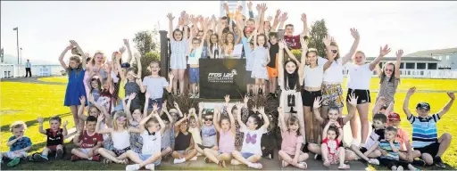  ??  ?? Children presenting the last race at Ffos Las Racecourse on Sunday.