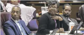  ?? ANTHONY VAZQUEZ/SUN-TIMES FILE ?? Alds. Greg Mitchell (7th, from left), Michelle Harris (8th) and Anthony Beale (9th) at a Council meeting last year. Mitchell ran unopposed Tuesday, while Harris and Beale had big leads.