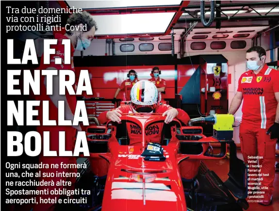  ?? FOTO FERRARI ?? Sebastian Vettel e i tecnici Ferrari al lavoro nel test di martedì scorso al Mugello, utile per provare i protocolli