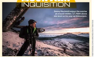  ??  ?? Danny MacAskill enjoys the sunrise at around 5400m / 17,700ft above sea-level on his way up Kilimanjar­o.