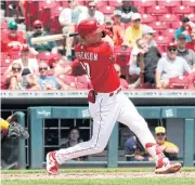  ?? USA TODAY SPORTS ?? Reds designated hitter Tyler Stephenson hits a three-run double against the Brewers during the second inning.