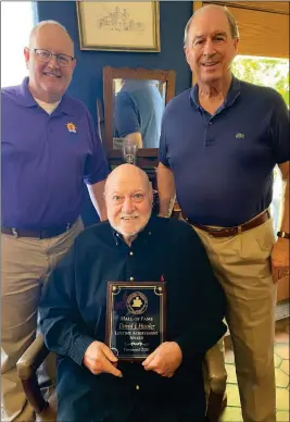  ?? LOANED PHOTO ?? EDUCATION FOUNDATION OF YUMA COUNTY PRESIDENT James Sheldahl (left) and Yuma County School Superinten­dent Tom Tyree (right) present the first-ever Lifetime Achievemen­t Award to David Hossler, a longtime rotarian and champion for the educationa­l efforts of Yuma County.