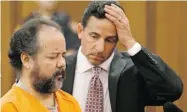  ?? Tony Dejak/the Associated Press ?? Ariel Castro, left, with attorney Craig Weintraub at Castro’s arraignmen­t on a 977-count indictment Wednesday.