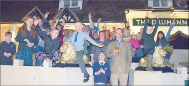  ?? Picture: Alison Morris ?? Villagers celebrate at the Drum Inn pub in Stanford after the government dropped its plans for the lorry park off the M20