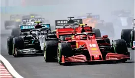  ?? FOTO: JOE KLAMAR/LEHTIKUVA ?? Ferraris Charles Leclerc blev varvad av Mercedes Valtteri Bottas i Ungerns GP.