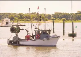  ?? Peter Hvizdak / Hearst Connecticu­t Media file photo ?? A commercial fishing vessel is moored near Lang Dock at Lobster Landing in Clinton as shown in a file photo.