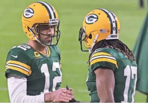  ?? MARK HOFFMAN/JOURNAL SENTINEL ?? Packers QB Aaron Rodgers no longer has Davante Adams to throw to after the receiver was traded to the Raiders.