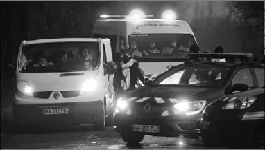  ??  ?? French gendarmes talk to youths following the break-up of the party near a disused hangar in Lieuron on January 2. (Photo:CNN)