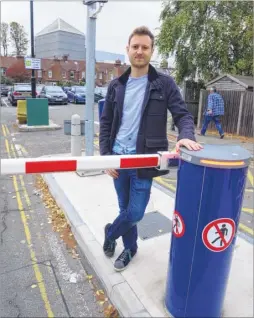  ?? Picture: Chris Davey FM4964436 ?? Cllr Ben Fitter-harding and the ANPR barriers at the Pound Lane car park